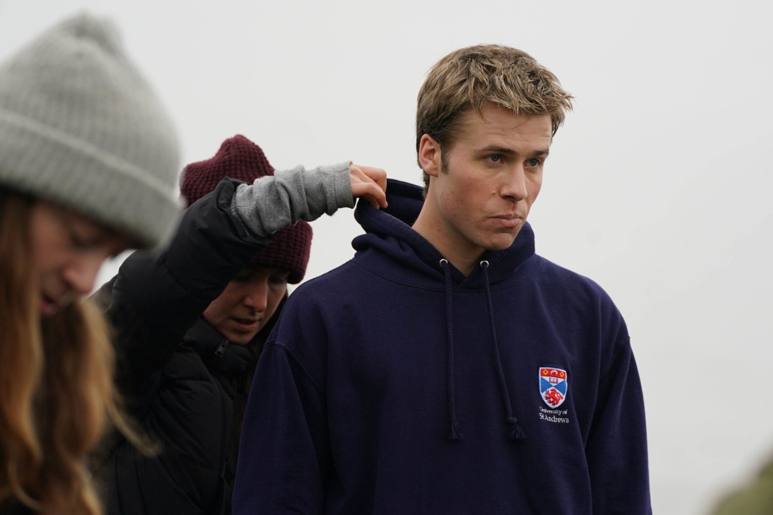 The Crown actor spotted jogging through St Andrews as filming continues 