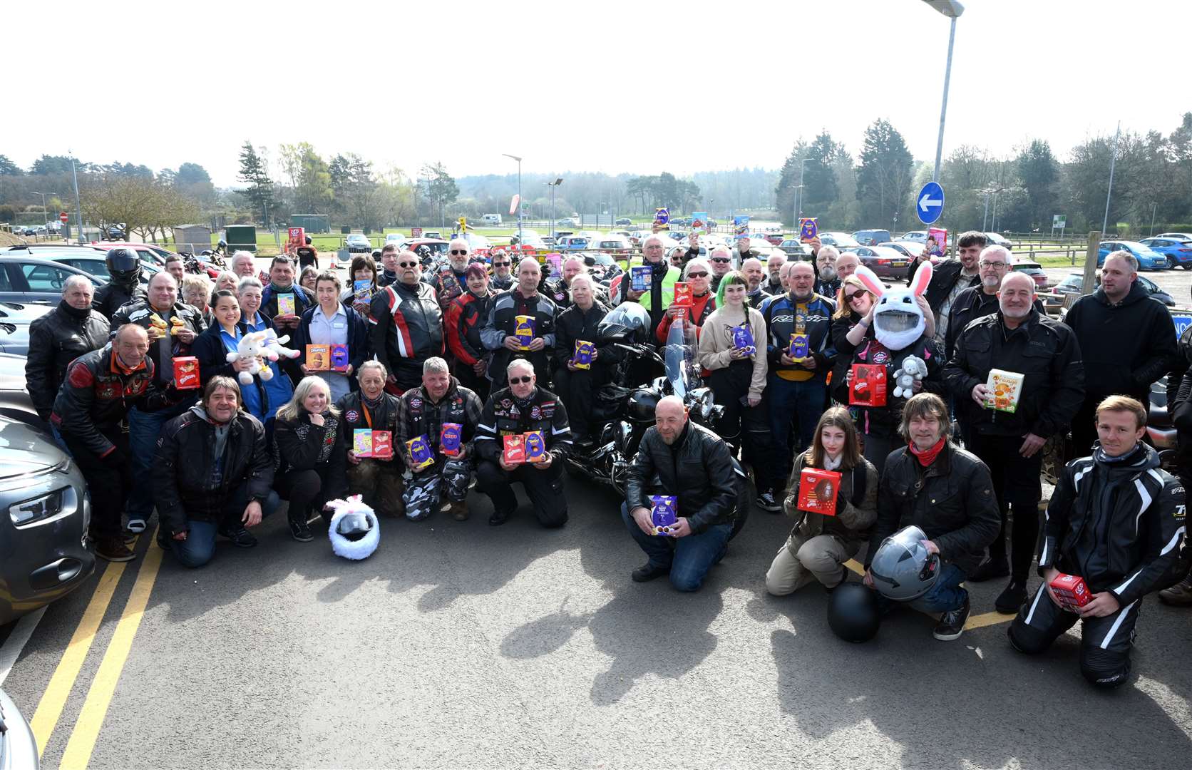 Members of the Freewheel Cruise Riders Association delivering Easter eggs to children at the QEH