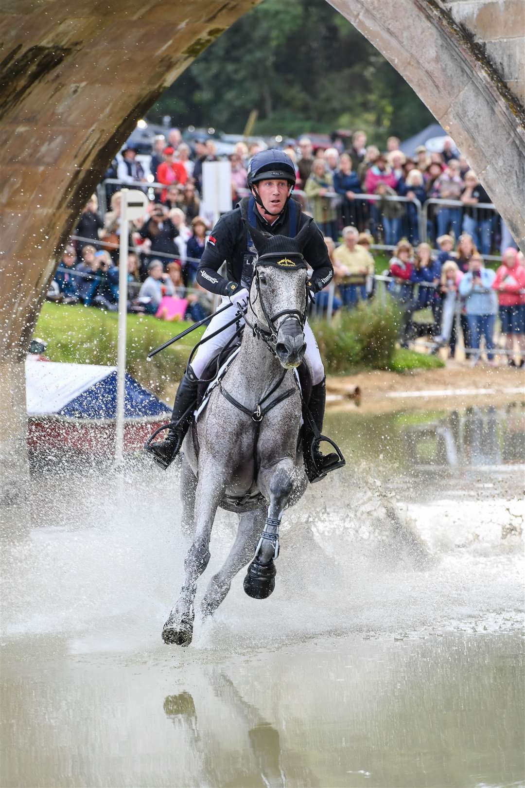 Oliver Townend competing at Burghley