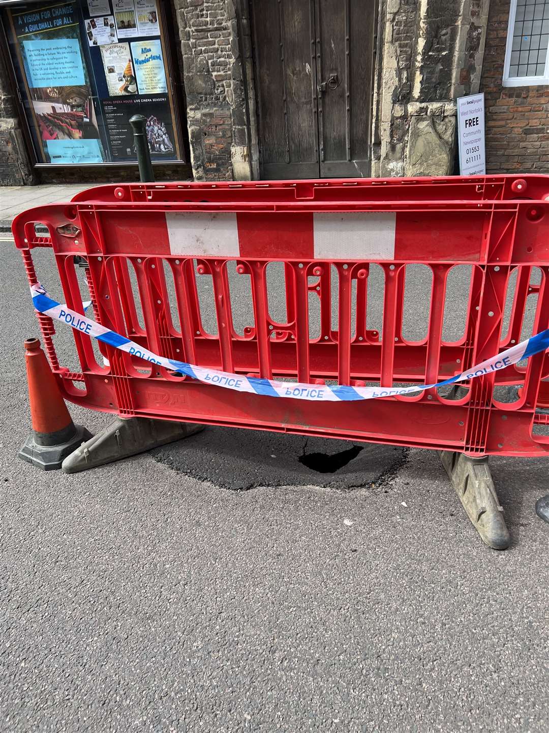 The sinkhole has appeared close to St George's Guildhall in Lynn
