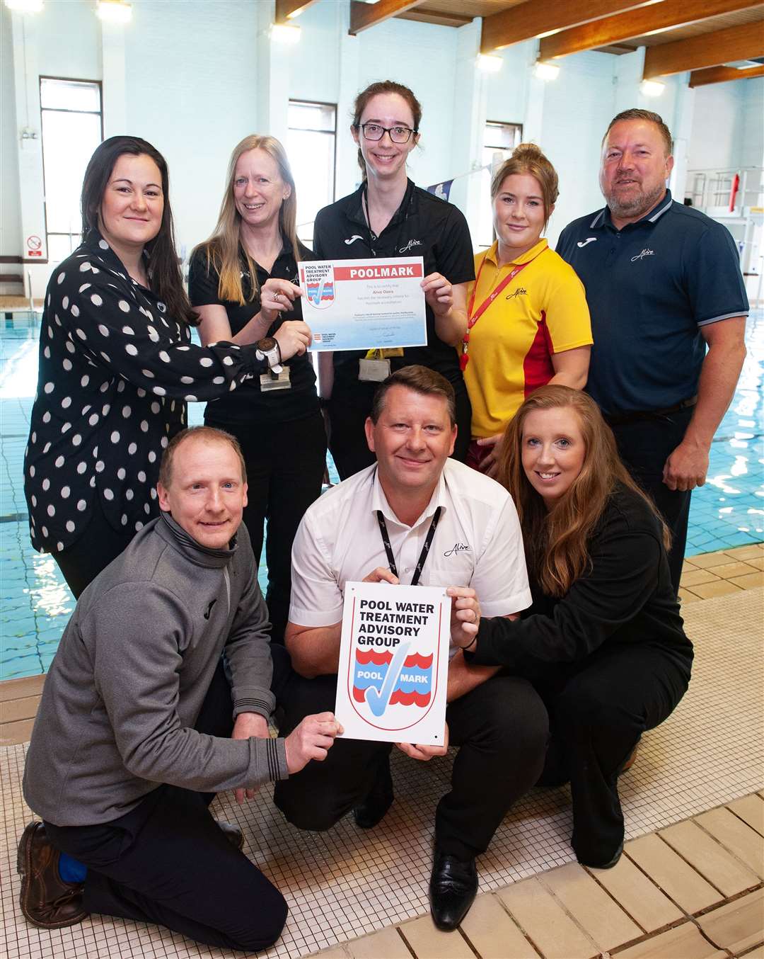 Pictured are Neil Gromett, Dave Cleland, Louise Biggs, Siobhan Cleeve, Jon Bunting, Mair Morton, Cathryn Hancock and Molly Gromett at St James Swimming Pool