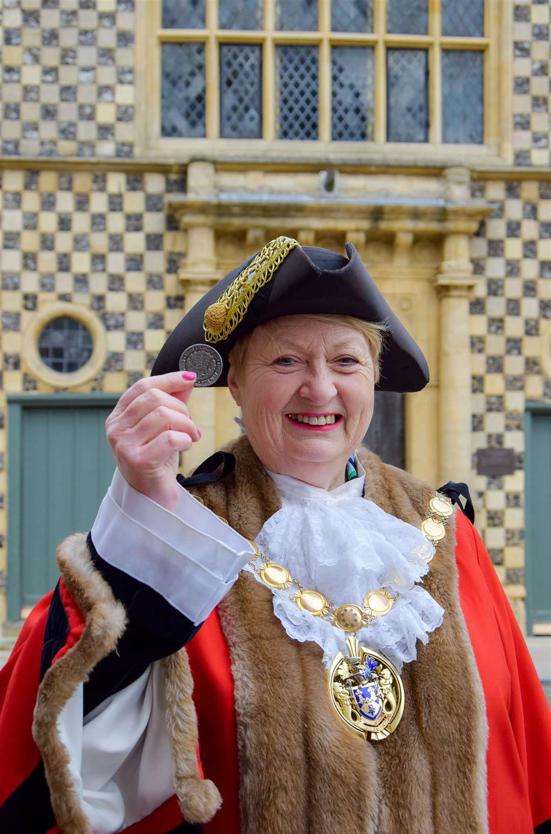Cllr Lesley Bambridge pictured with the coronation coin