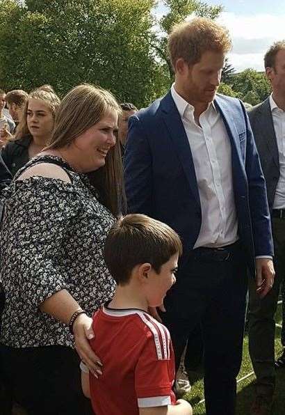 Jack at the Buckingham Palace garden party with his mum and Prince Harry in 2017