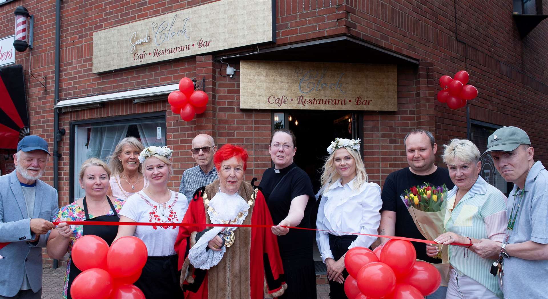 Borough mayor Margaret Wilkinson officially opens the Sand Clock Cafe and Restaurant Bar
