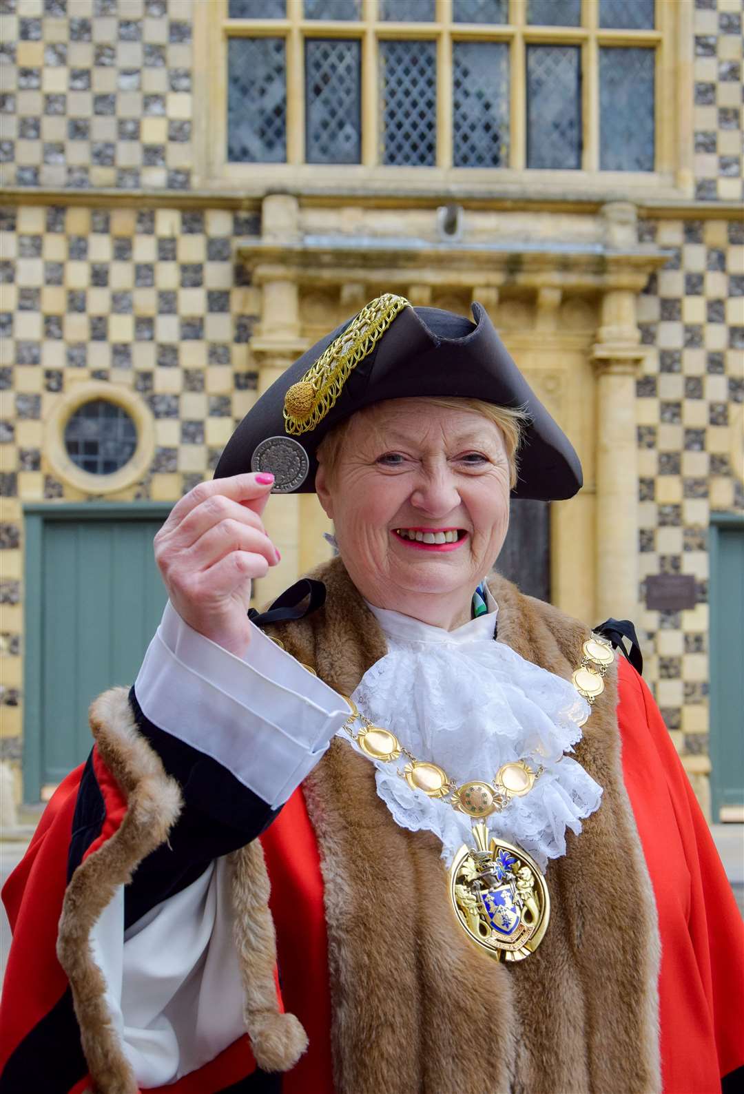 Cllr Lesley Bambridge pictured with the coronation coin