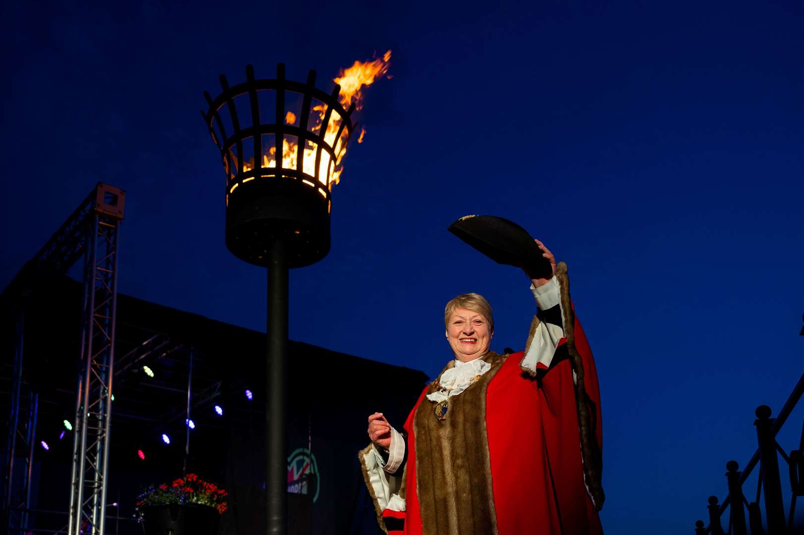 Cllr Bambridge lighting the beacon at the Queen’s Platinum Jubilee celebrations in Lynn