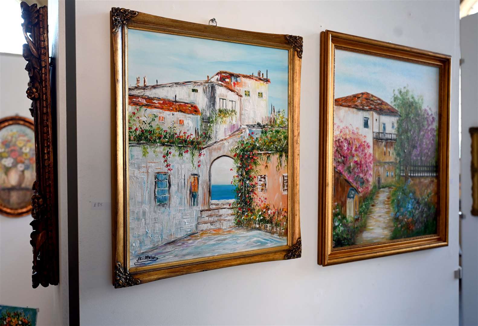 Two of the many paintings on display at the Custom House