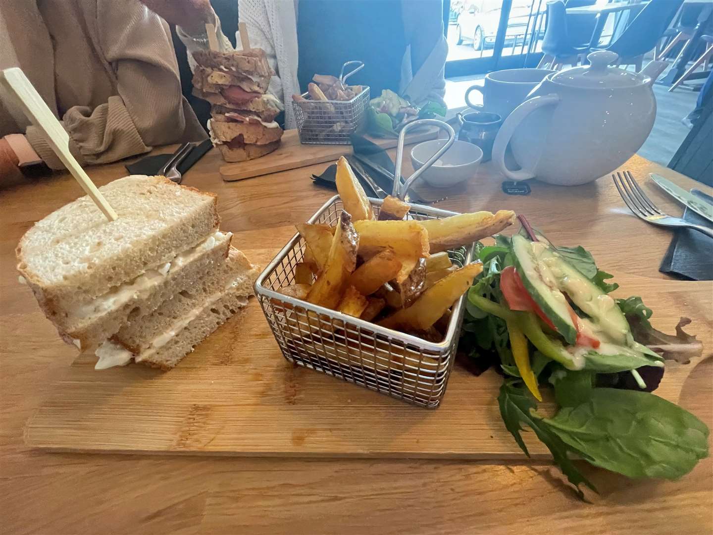 My egg mayo sandwich with chips and salad – which was topped with a lovely dressing