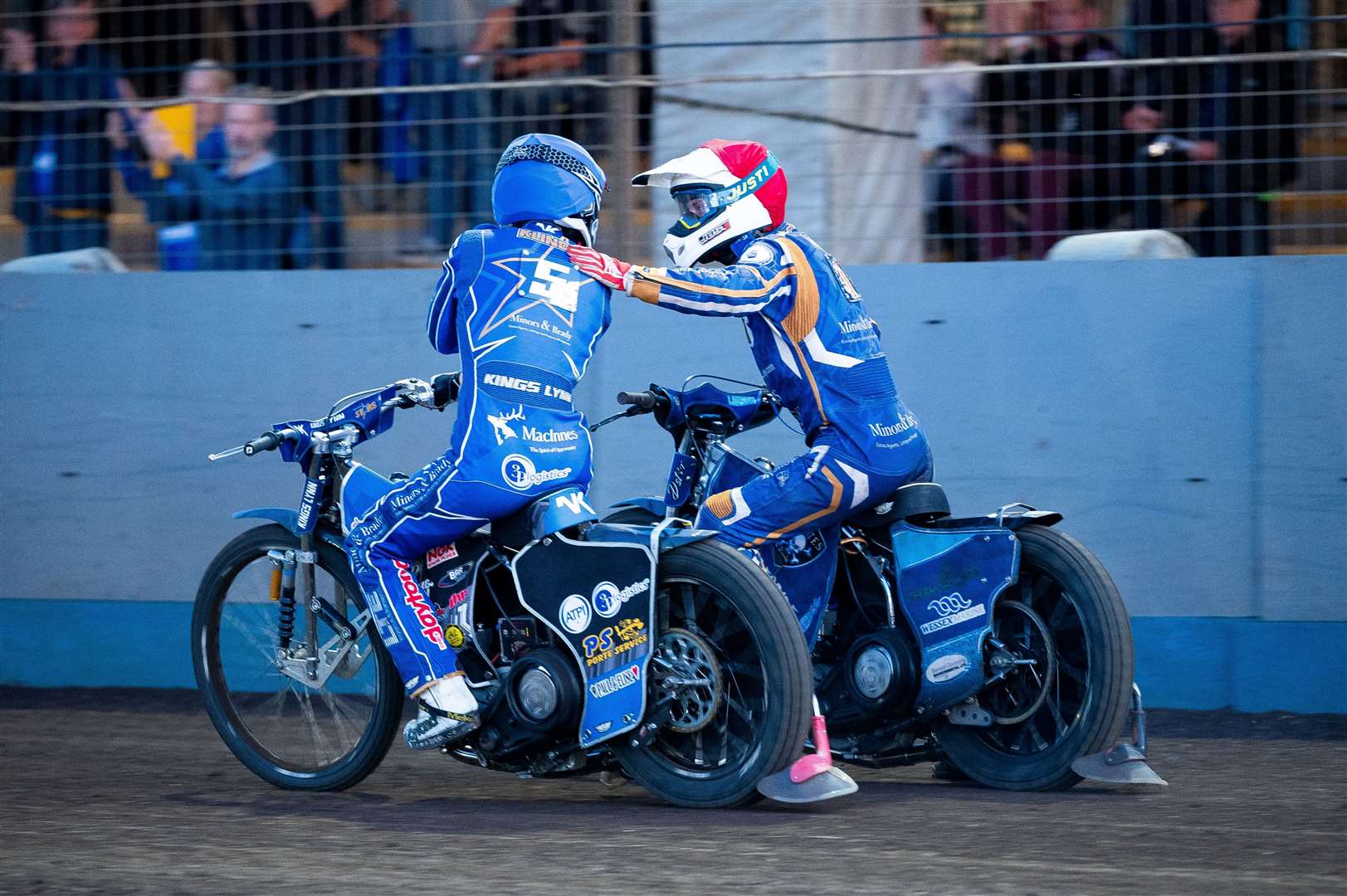 Action from King's Lynn against Peterborough at the Adrian Flux Arena. Pictures: Ian Burt