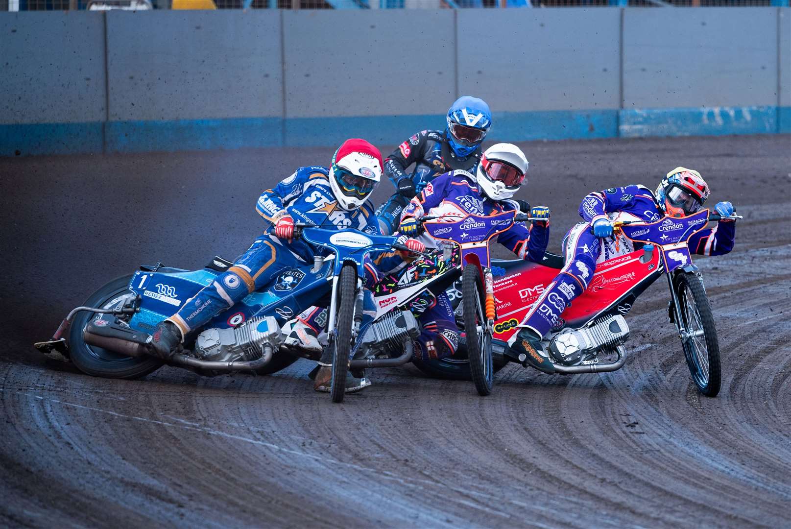 Action from King's Lynn against Peterborough at the Adrian Flux Arena. Pictures: Ian Burt