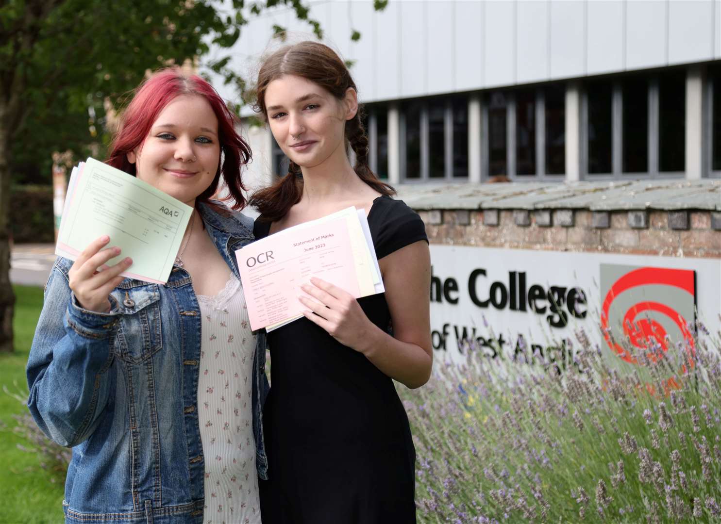 Amelia Szajnowska, left, and Mikayla Temple on A Level results day at The College of West Anglia in Lynn