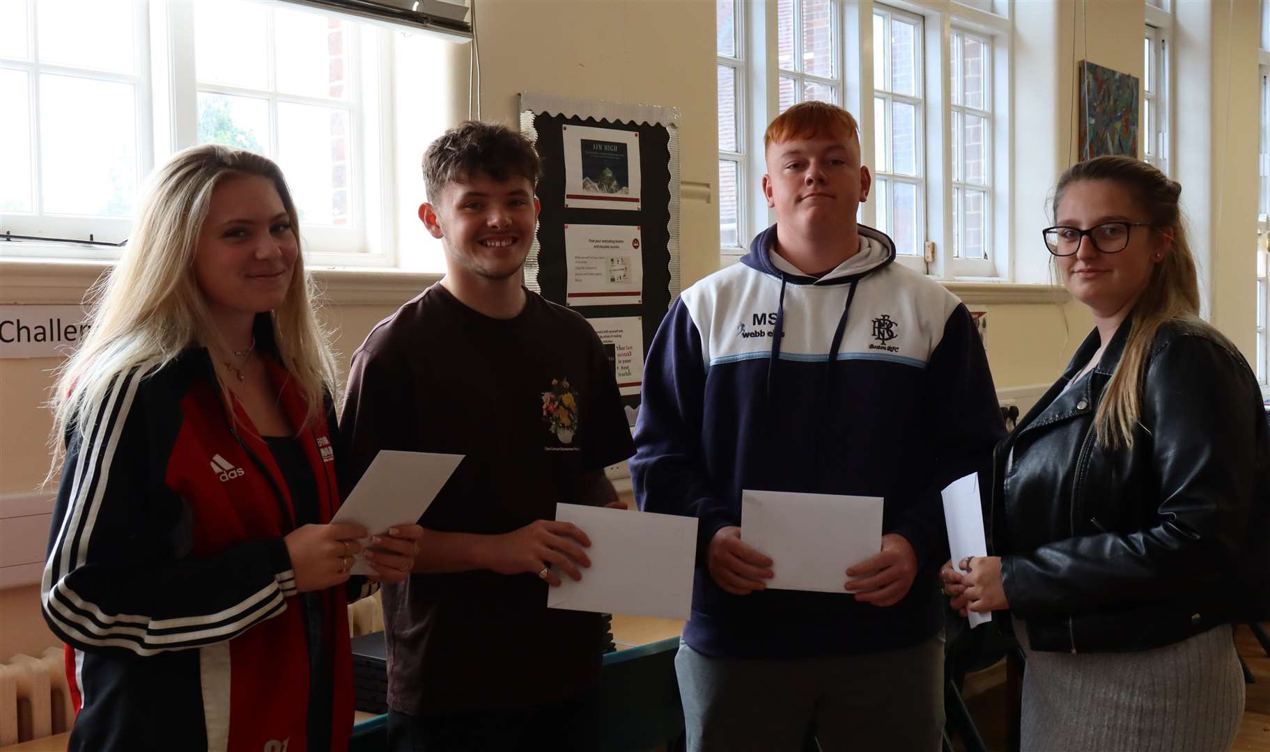 Students with their results at KES
