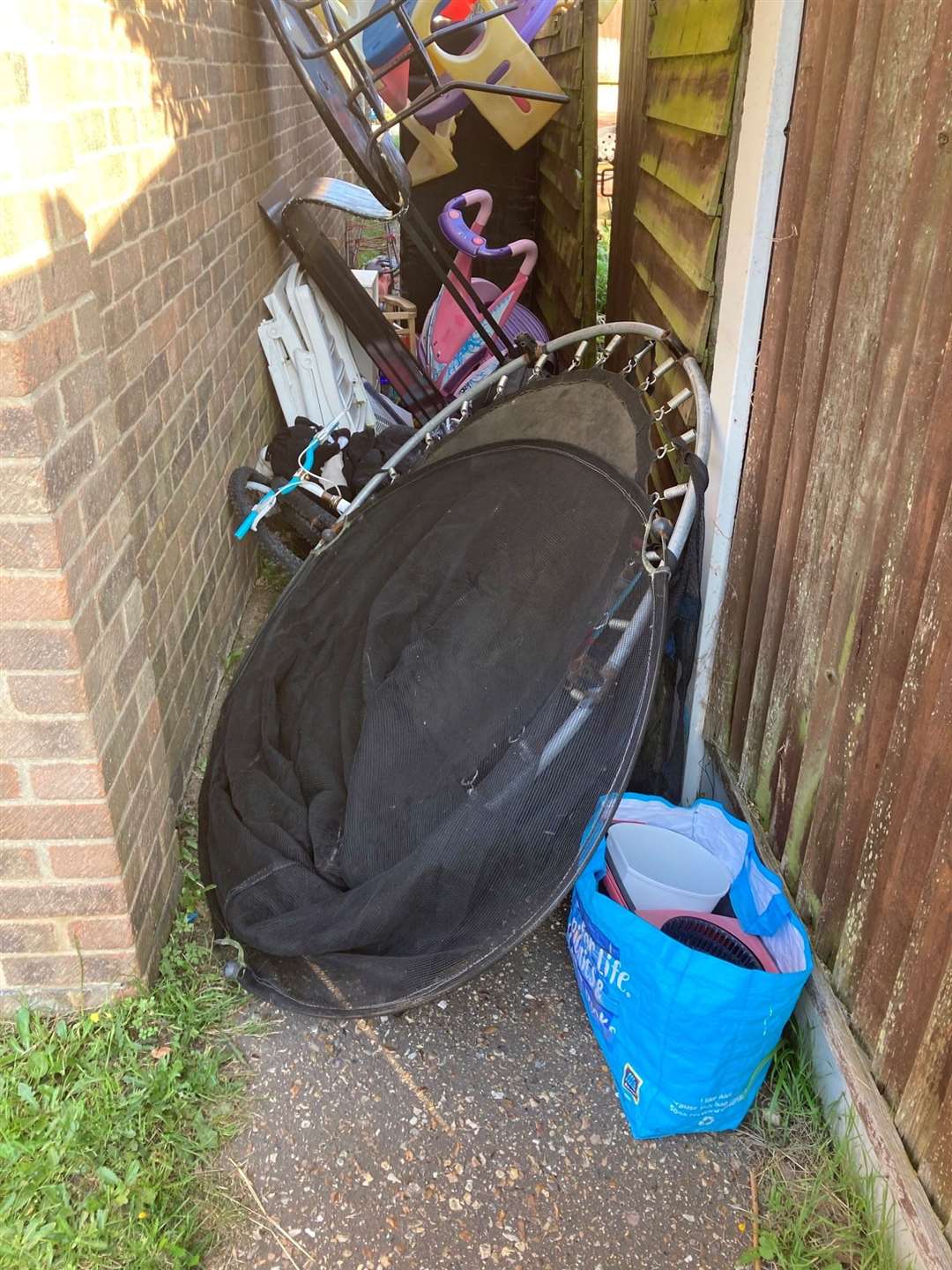 Children's toys were among the items dumped in an alleyway on Westfield