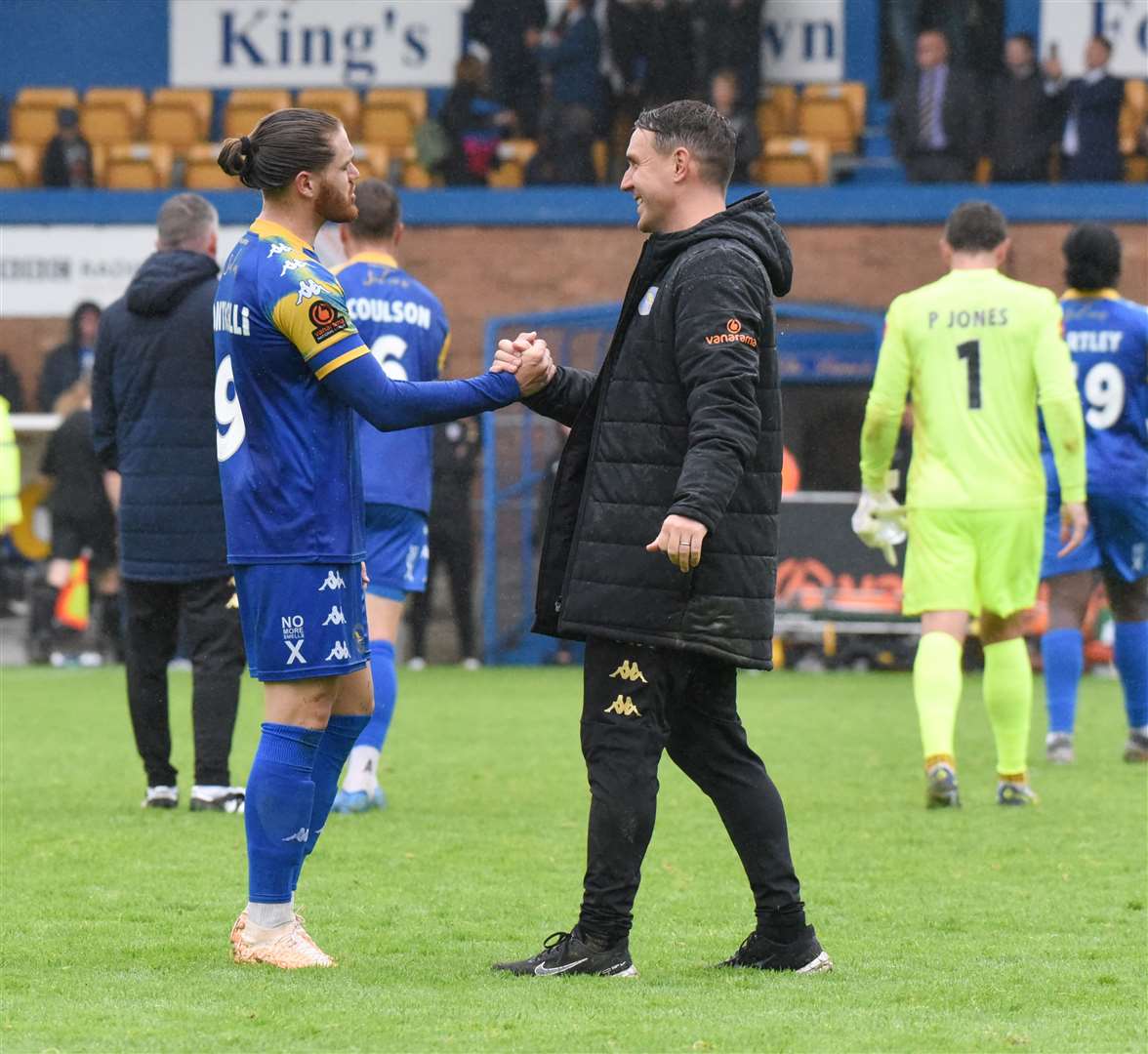 King's Lynn Town manager and the scorer of his side's two gols, Jordan Ponticelli. Photo: Tim Smith