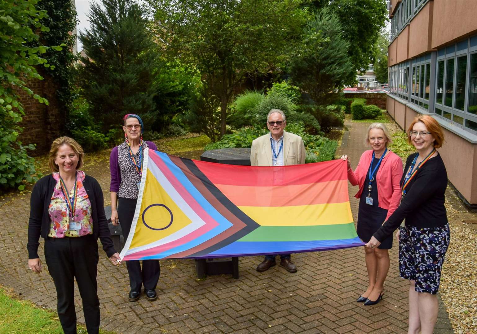 Pride flag is raised at West Norfolk Council's offices on Chapel Street. Pictured, from left, Tina Underwood, UNISON West Norfolk local government branch secretary; Fabia Pollard, UNISON chair; Terry Parish, leader of the borough council; Lorraine Gore, chief executive of the borough council; and Louise Gayton, UNISON equalities officer. Picture: West Norfolk Council