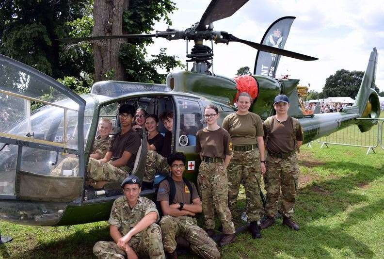 The cadets had their photo taken at the Army Air Corps helicopter. Credit: MOD