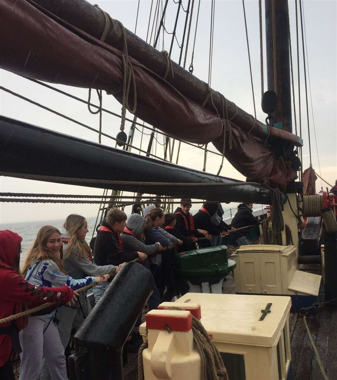 Crew duties included hauling all the ropes to set and trim the sails. Credit: Barking Dog Media.