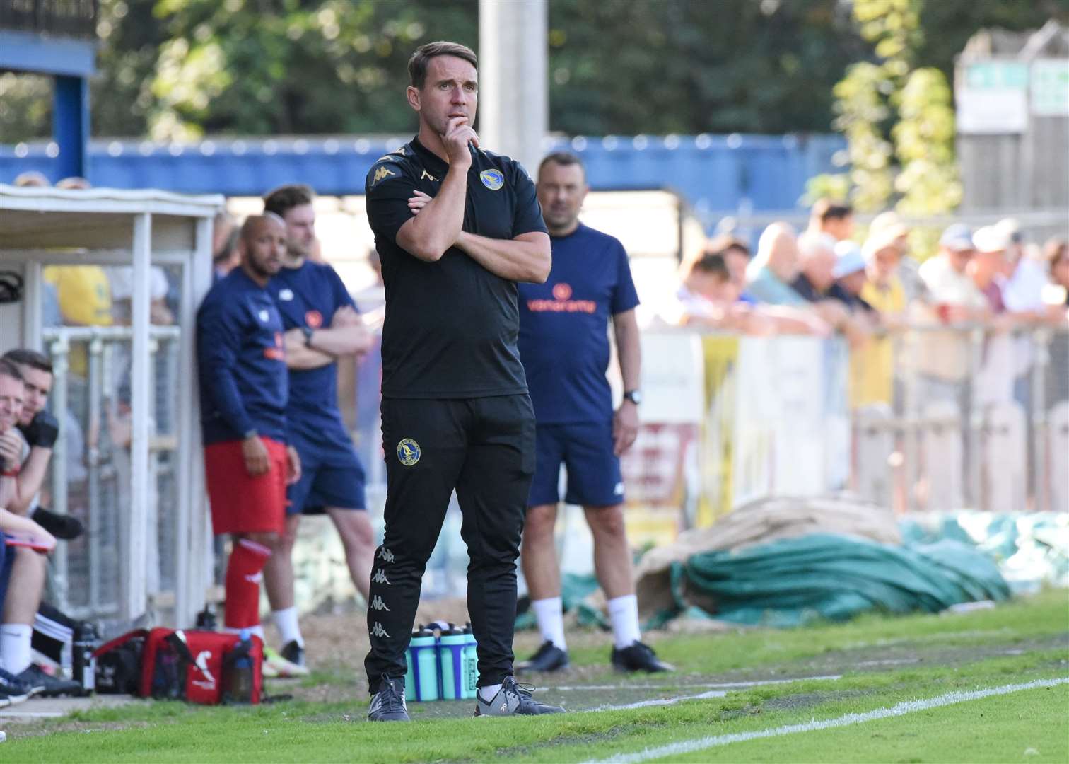King's Lynn Town suffered an embarrassing exit in their FA Cup replay at Aveley this evening to leave manager Mark Hughes under more pressure.