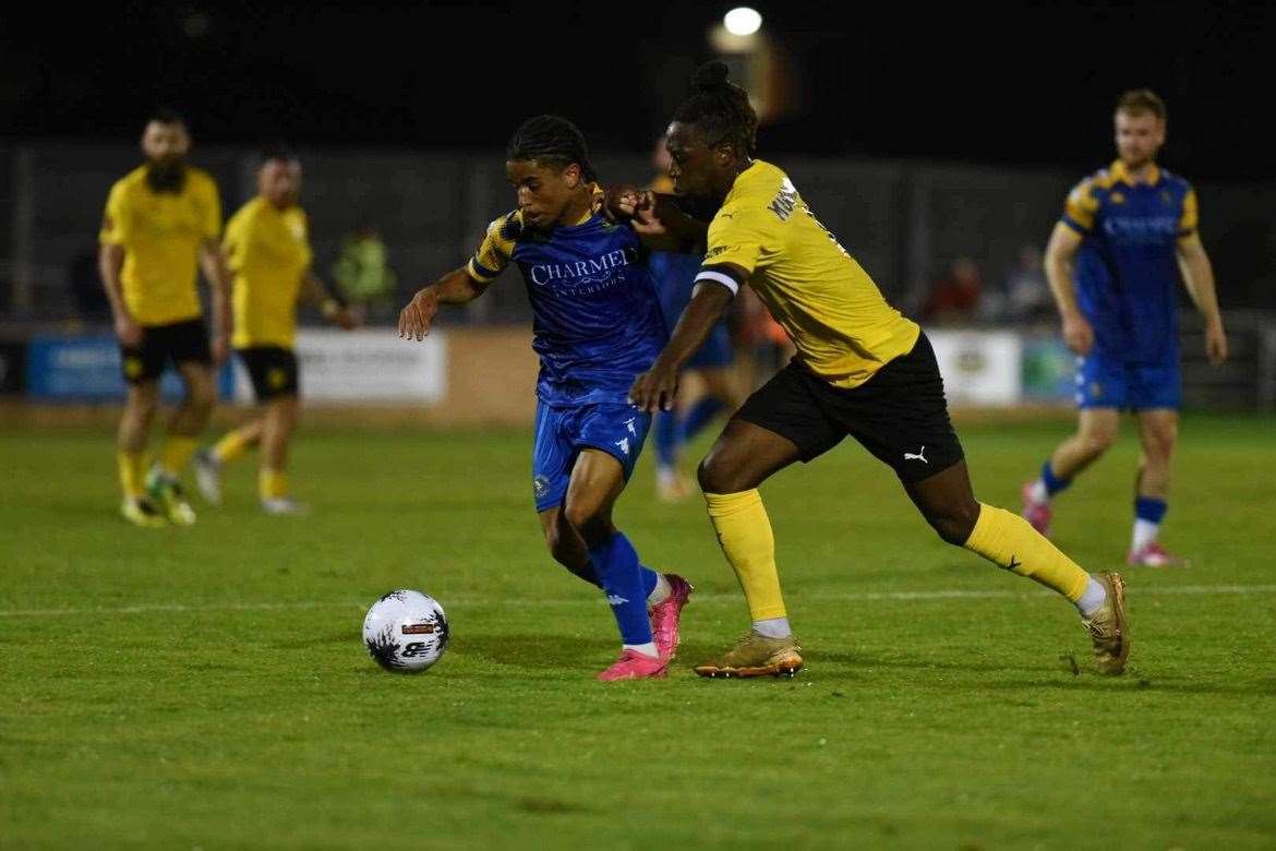 Ismael Fatjado causes problems for Brackley Town at The Walks. Picture: Tim Smith