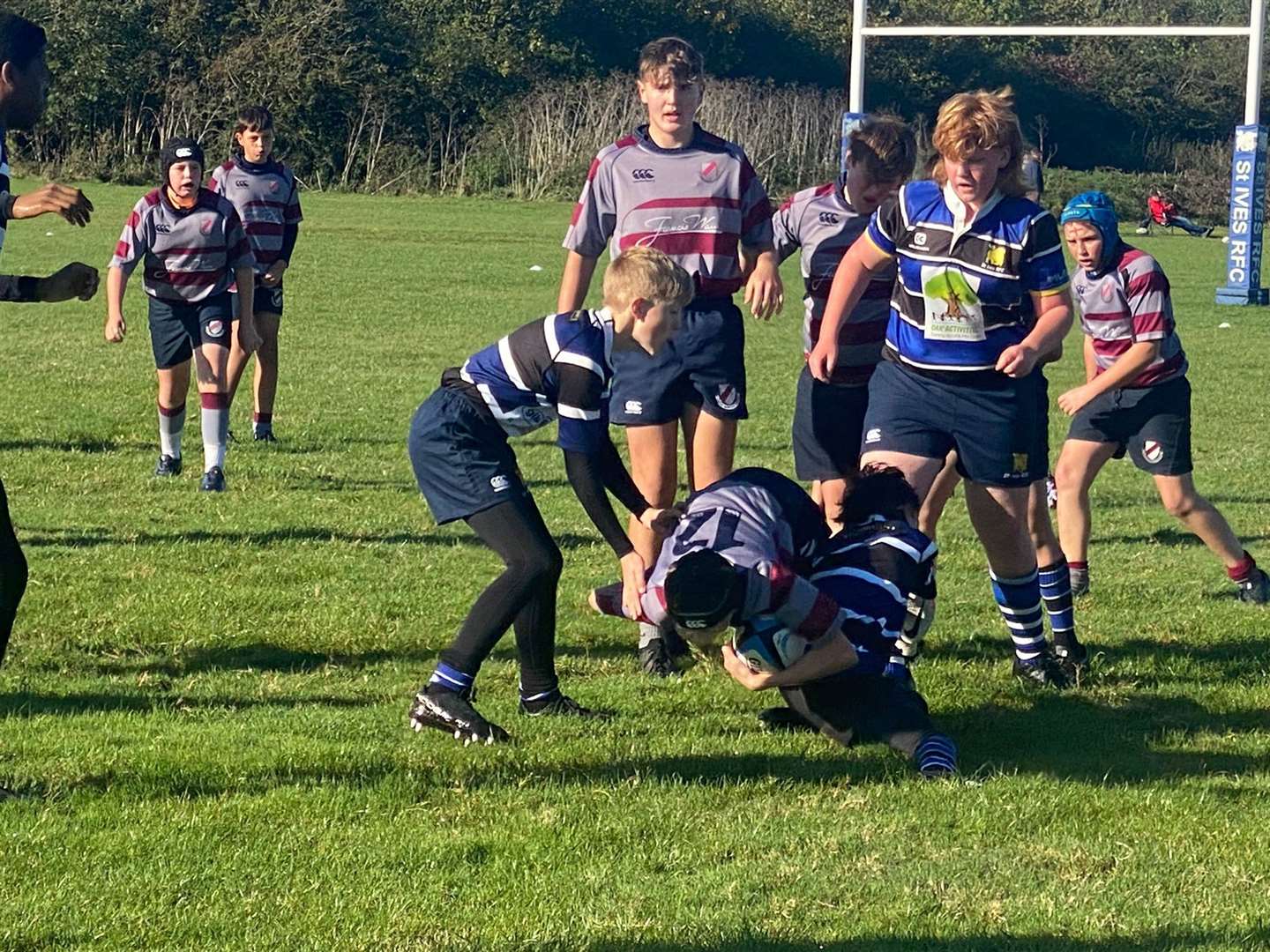 Action from the game between St Ives and West Norfolk U13s