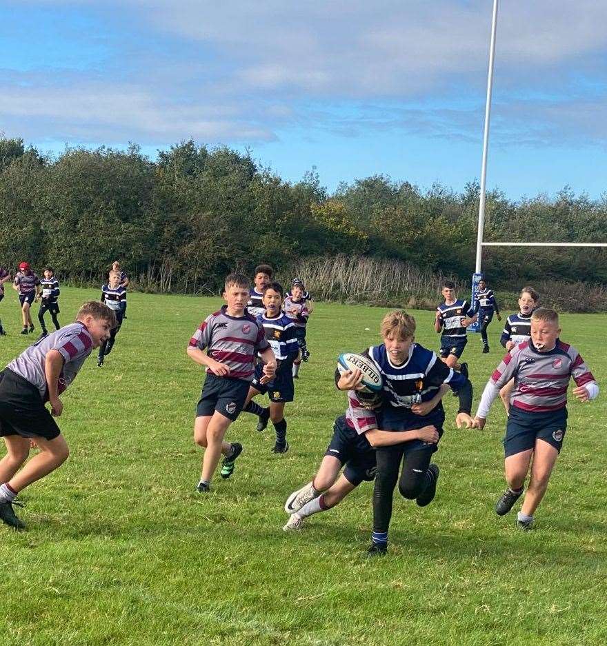Action from the game between St Ives and West Norfolk U13s
