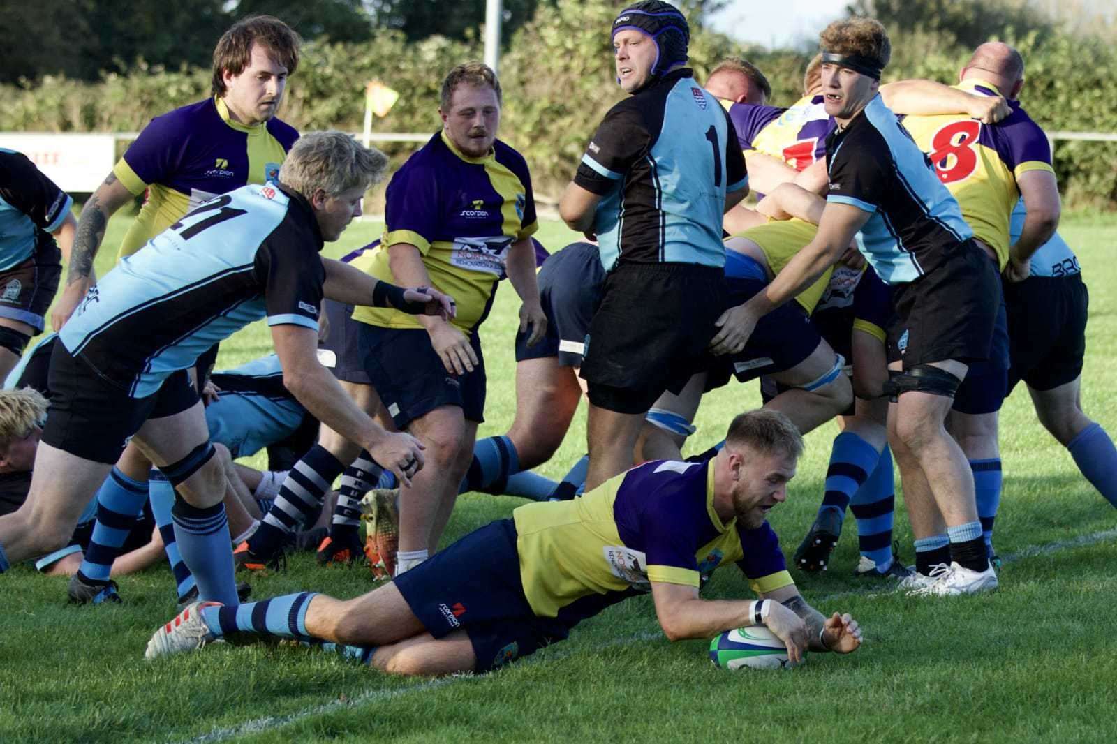 Action between Fakenham and Woodbridge at The Stringer Ground on Saturday. Picture: James Peeling