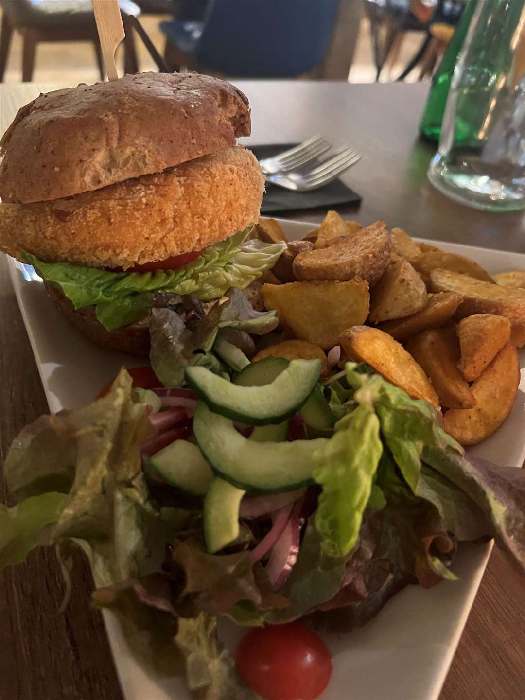 My chickpea and sweetcorn burger with Cajun wedges and slaw (£15.95)