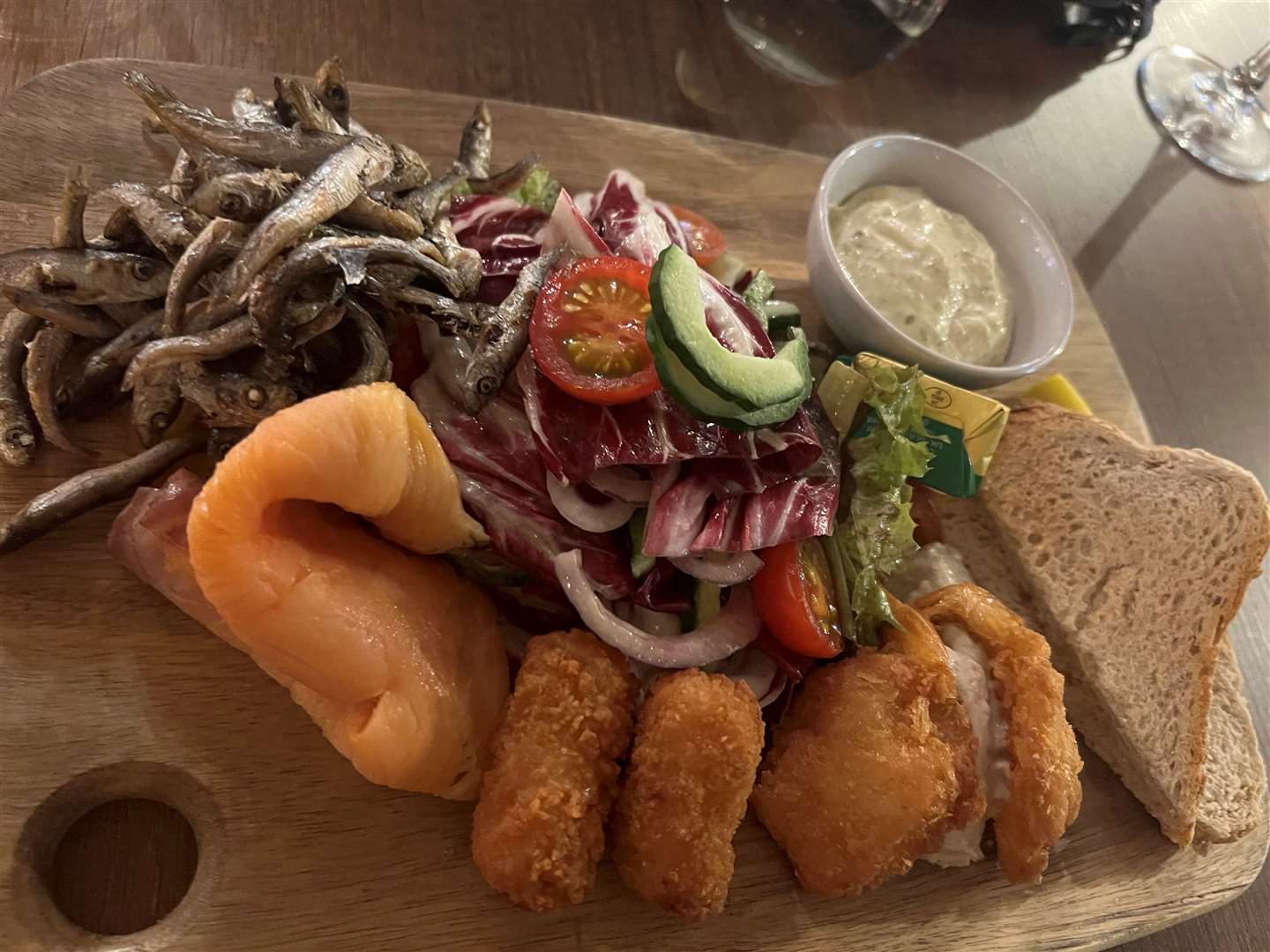 Shane's fish platter including scampi, smoked salmon, breaded butterfly king prawns, whitebait, mackerel pate, tartare sauce, rye bread and mixed house salad (£13.95)