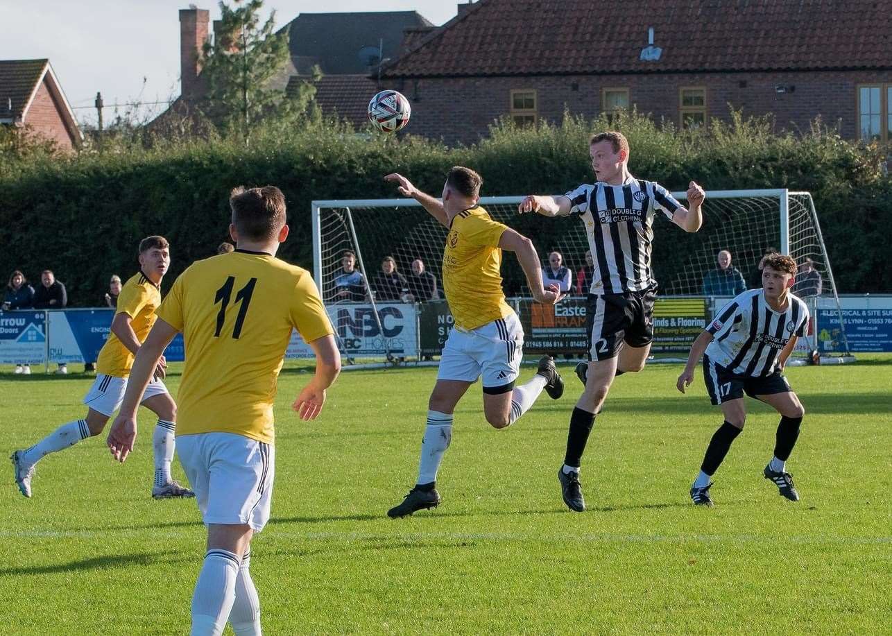Action between Heacham and Mildenhall Town on Saturday. Pictures: Phill Gwilliam