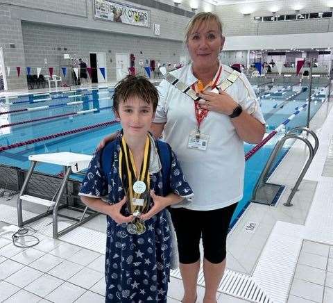 Den Vojevoda, winner of the award for Top Boy, pictured with President of Swim England Norfolk Cheryl Rose