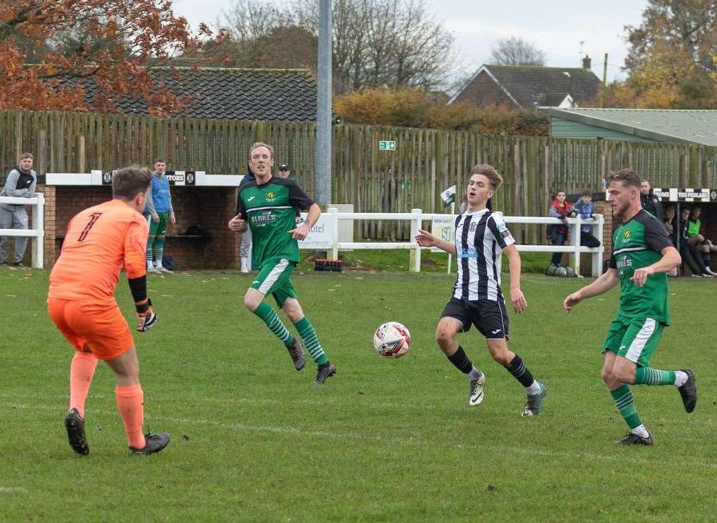 Blake Foster on the charge in Swaffham Reserves' game with Horsford