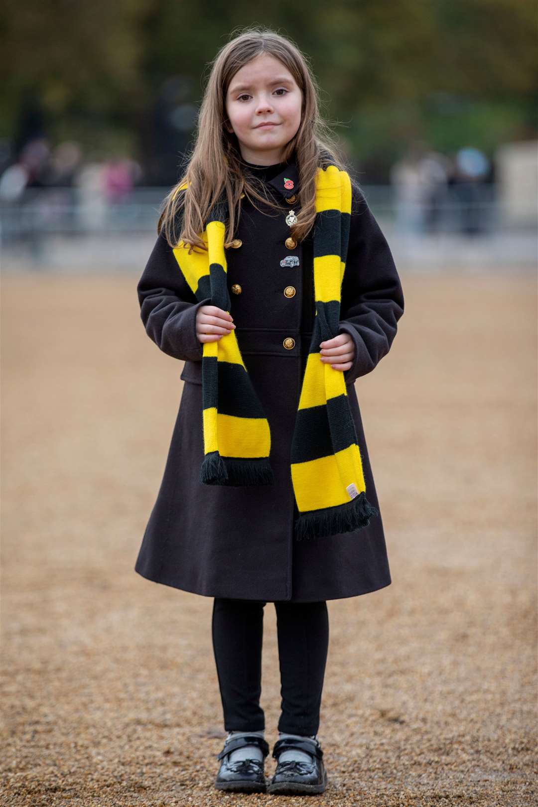 Eight-year-old Isabelle Bovington wearing her Scotty's scarf (Picture: Steve Reigate)