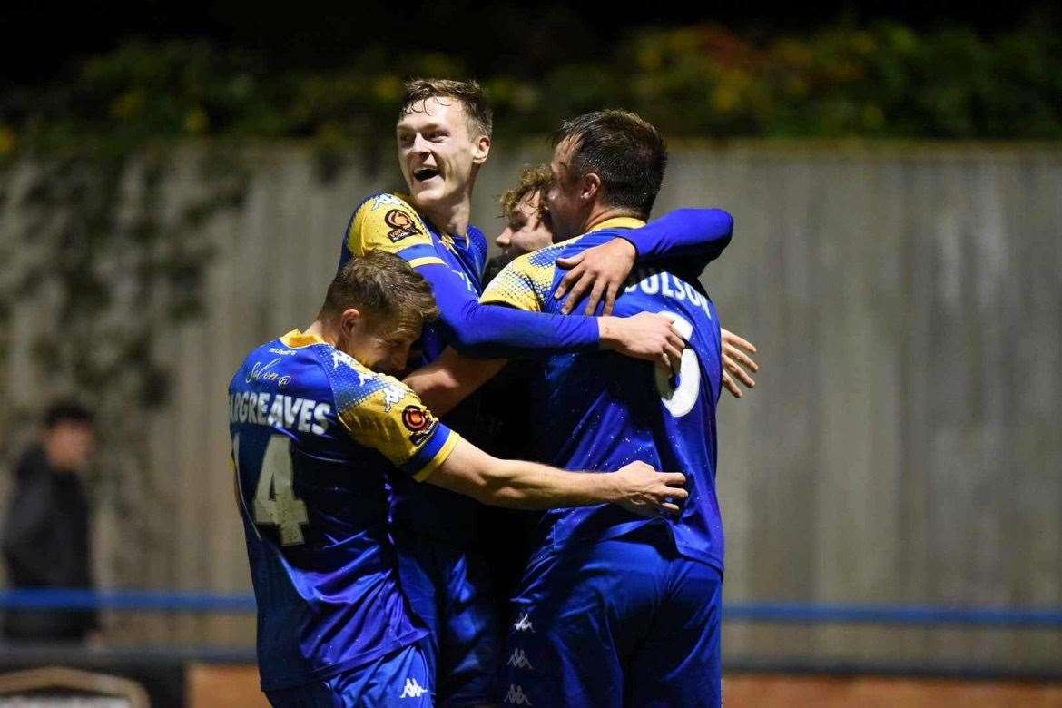 Lynn celebrate Josh Coulson's equaliser. Picture: Tim Smith