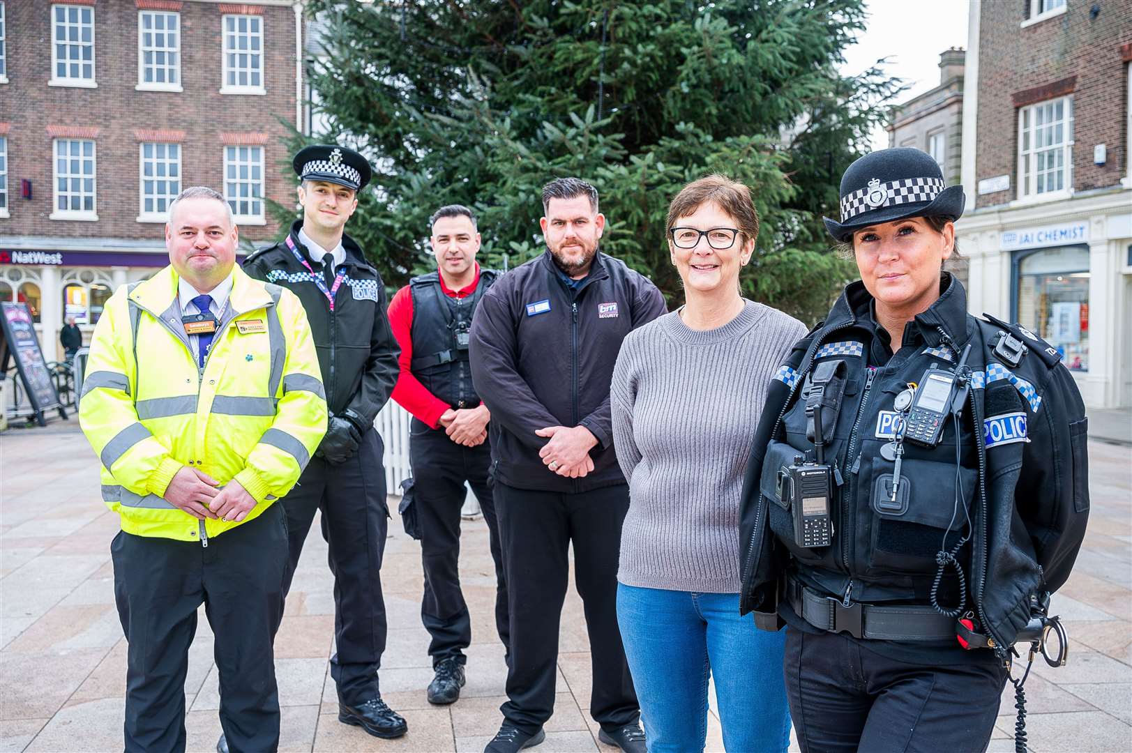 Shop workers, business owners, police and street rangers at the launch of Operation Wonderland. Picture: Ian Burt