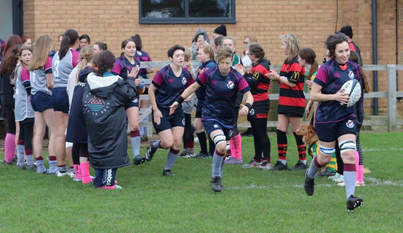The girls formed a guard of honour for the West Norfolk Warriors