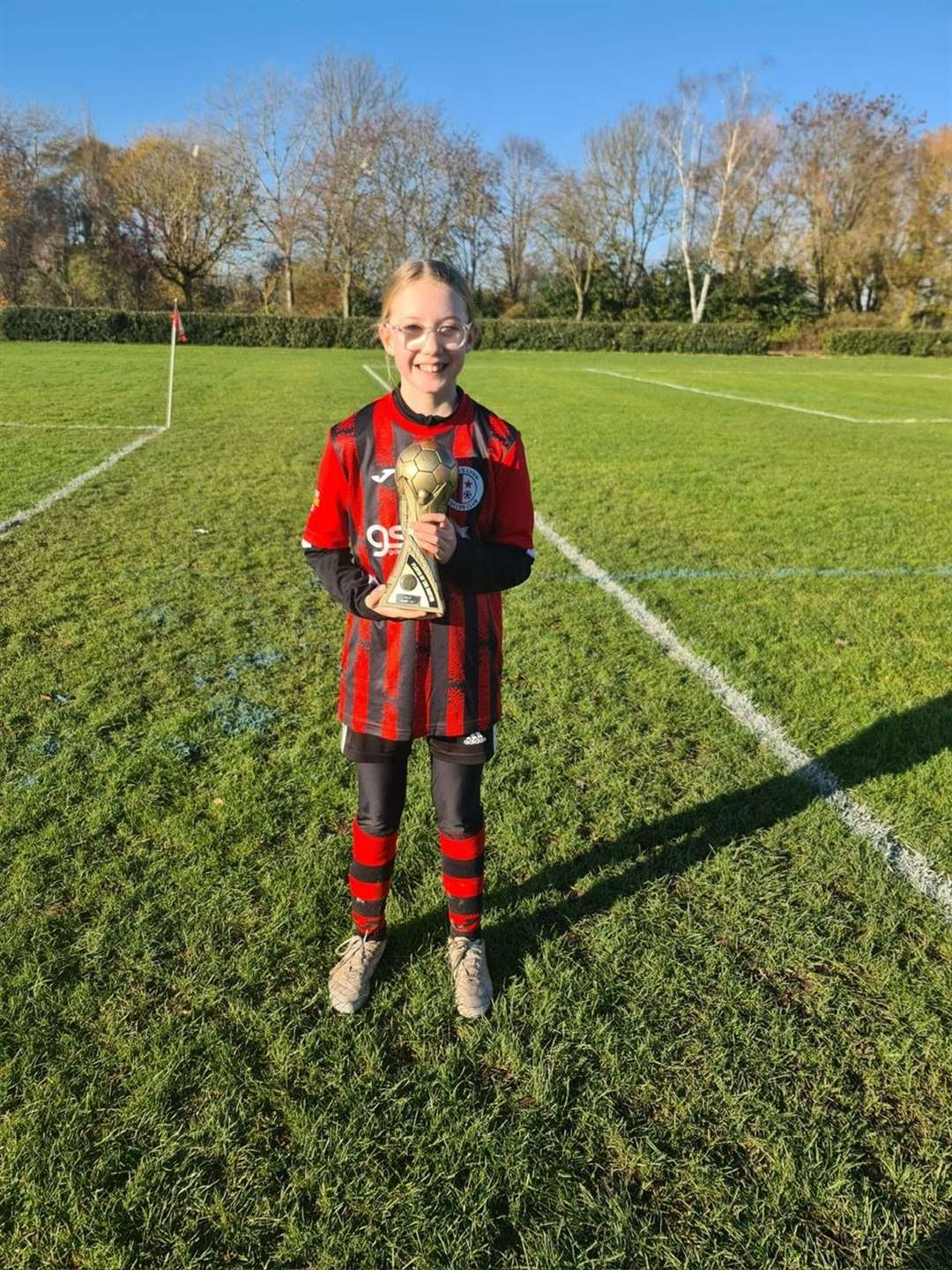 Hat-trick hero Summer Ellis with her player-of-the-match award.
