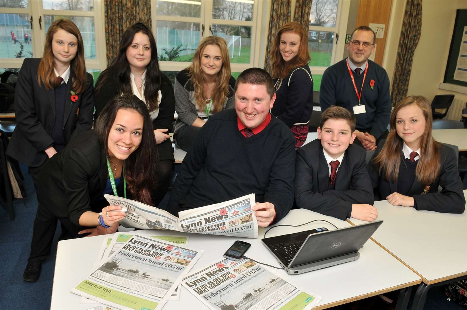 Pupils at Lynn’s King Edward VII High School in November 2013 with Allister Webb, news editor at the Lynn News