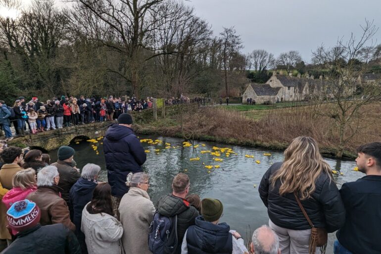 3000 rubber ducks take to river in Cotswolds village for annual race