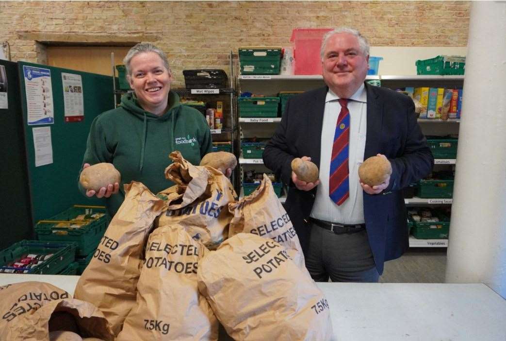 Helen Gilbert, project manager at King’s Lynn FoodBank, and Councillor Paul Kunes. Photo: West Norfolk Borough Council.