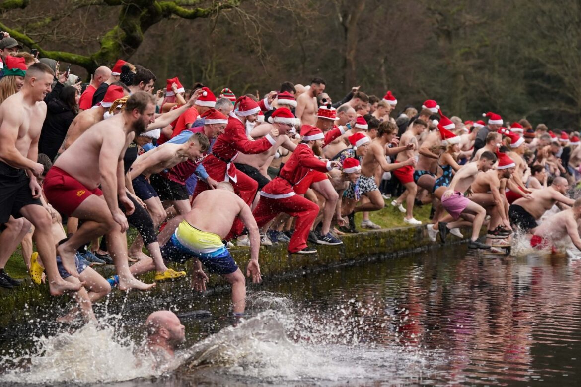 Christmas swimmers enjoy milder conditions