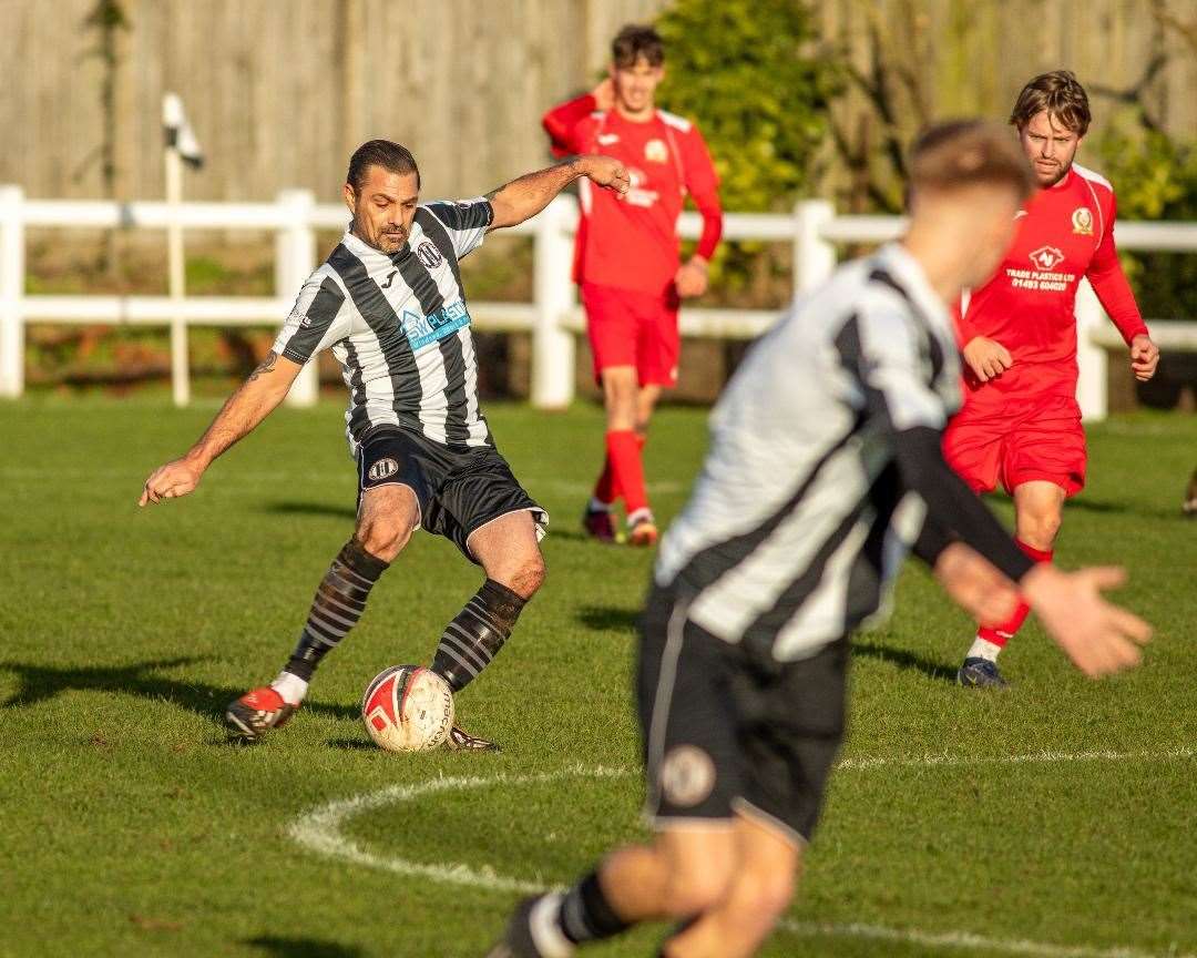 Returning to action, Ricky Toll sets up a Swaffham Reserves attack against Caister Reserves in the Anglian Combination on Saturday. Picture: Eddie Deane