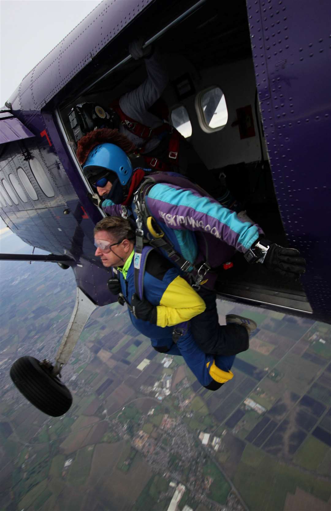 Ken taking off from the plane during his sky dive