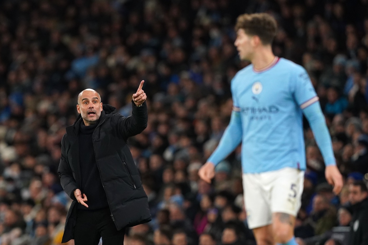 Stones blow dampens Manchester City joy at Champions League progress 