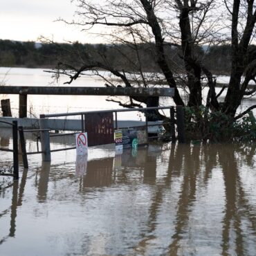 Flood warnings remain in place as cold weather alert issued