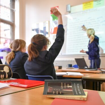 Girls outperform boys from early education to university, UK study finds