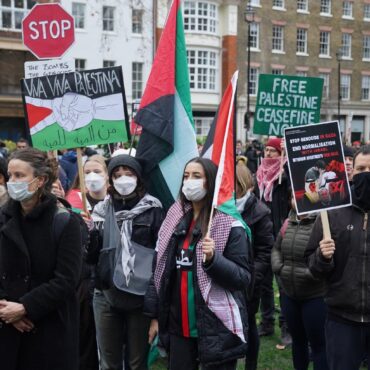 Pro-Palestinian protesters march on Oxford Street in London