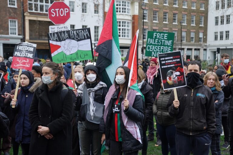 Pro-Palestinian protesters march on Oxford Street in London