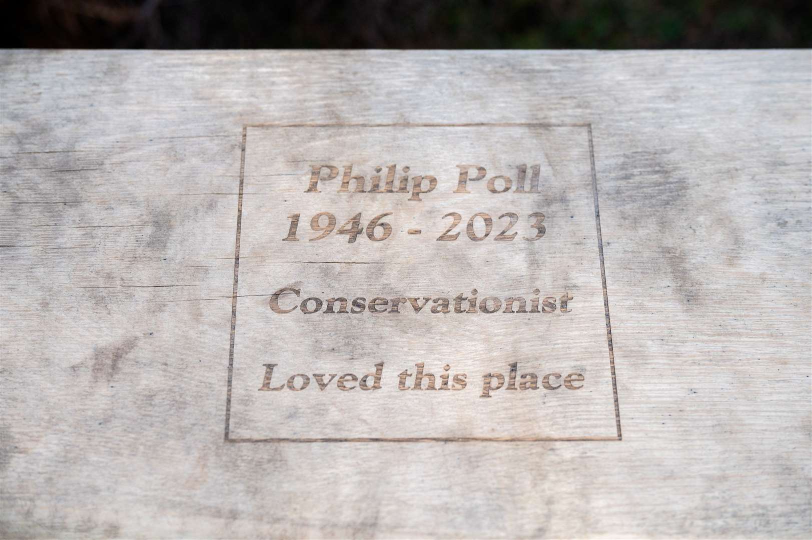 The inscription on the bench for Philip Poll