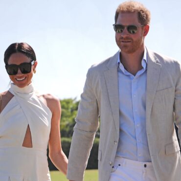 Harry and Meghan hand in hand at charity polo match