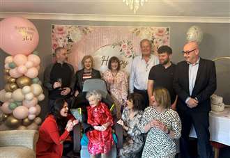 Joy celebrates 100th birthday with music, afternoon tea and card from King and Queen